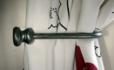 Bush End holdback in Polished Steel finish